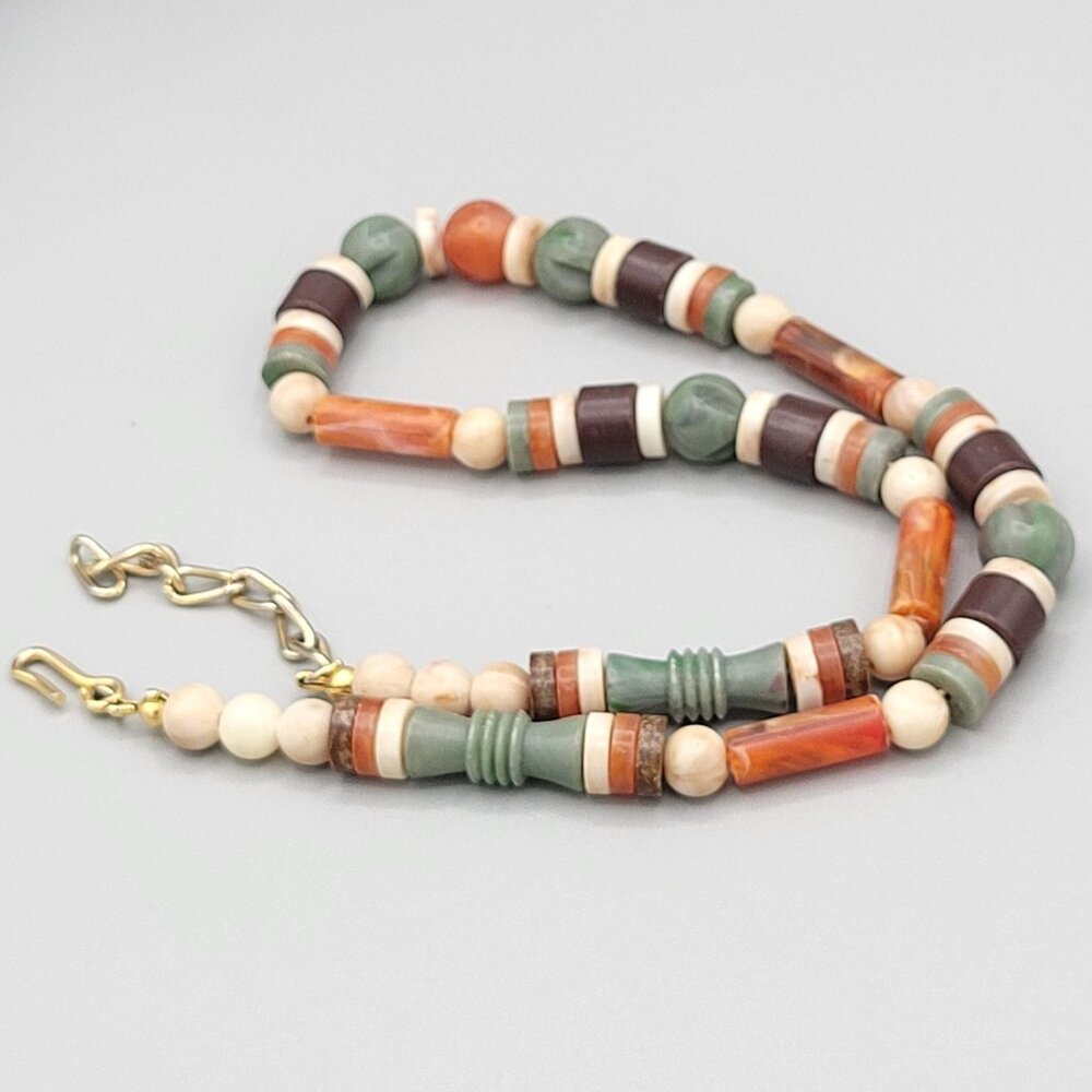 Multicolor Beaded Necklace With Carved Beads Hook Close Vintage Gold Tone Metal
